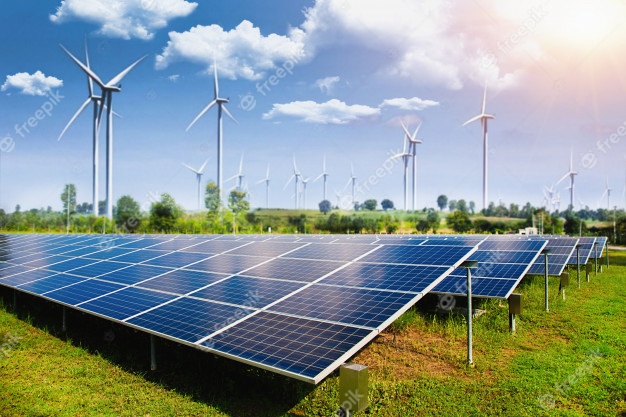 solar-panel-with-wind-turbines-against-mountains-sky_34237-198